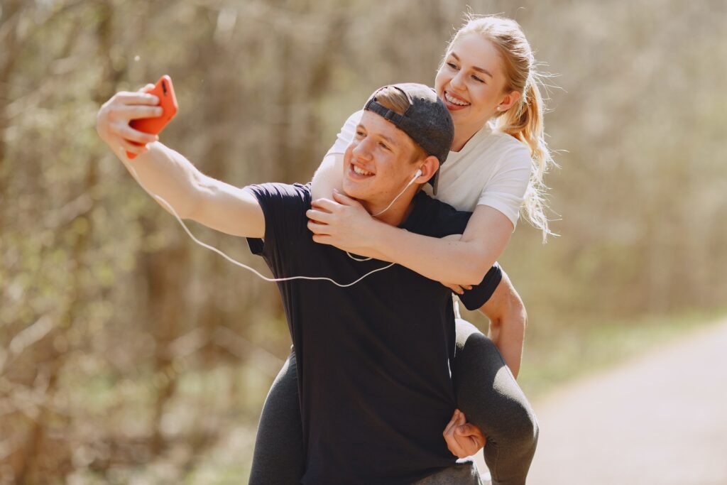 A boy and a girl taking a selfie