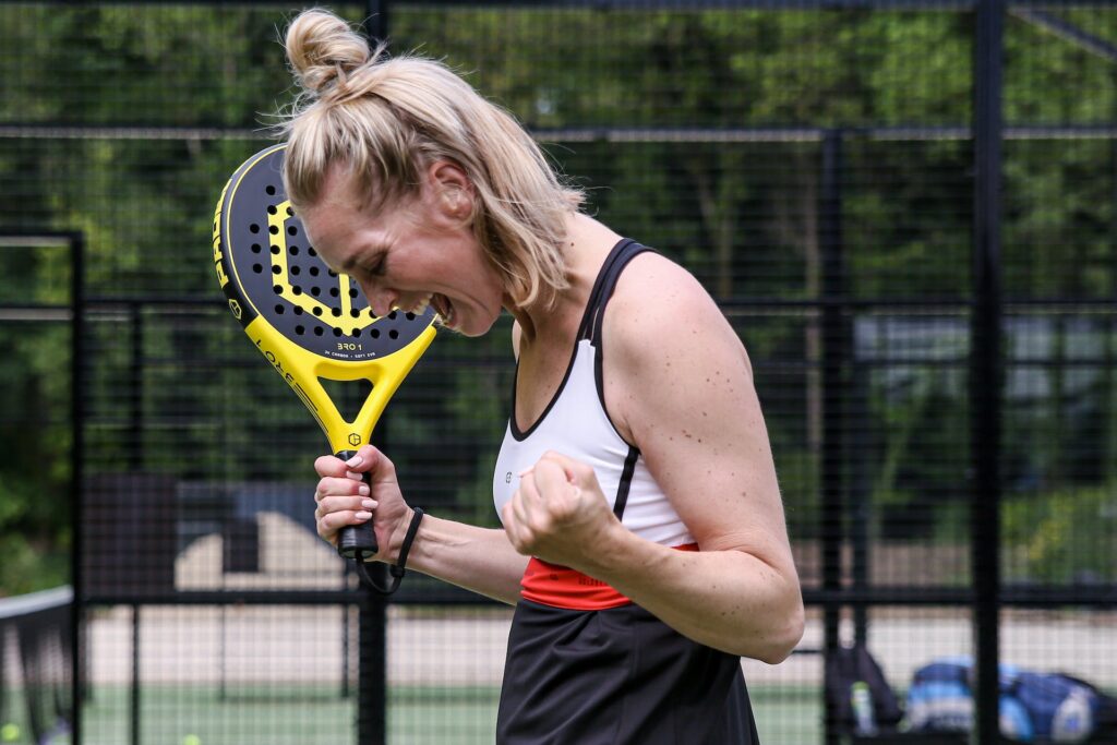 A Tennis player screaming looking at the ground to indicates the power of self-motivation techniques
