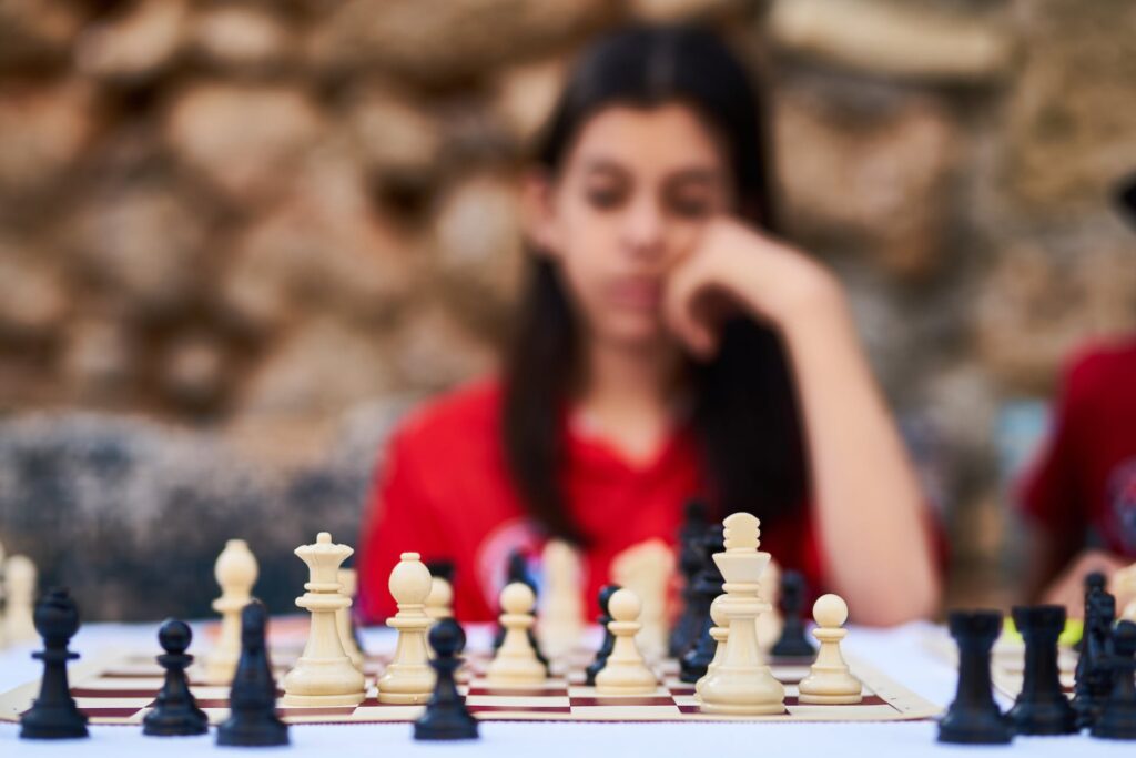 A Lady Playing Chess
