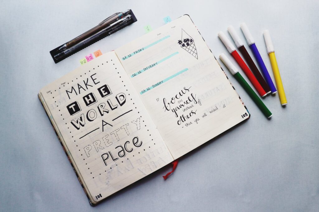 A bullet journal with an inspirational quote
