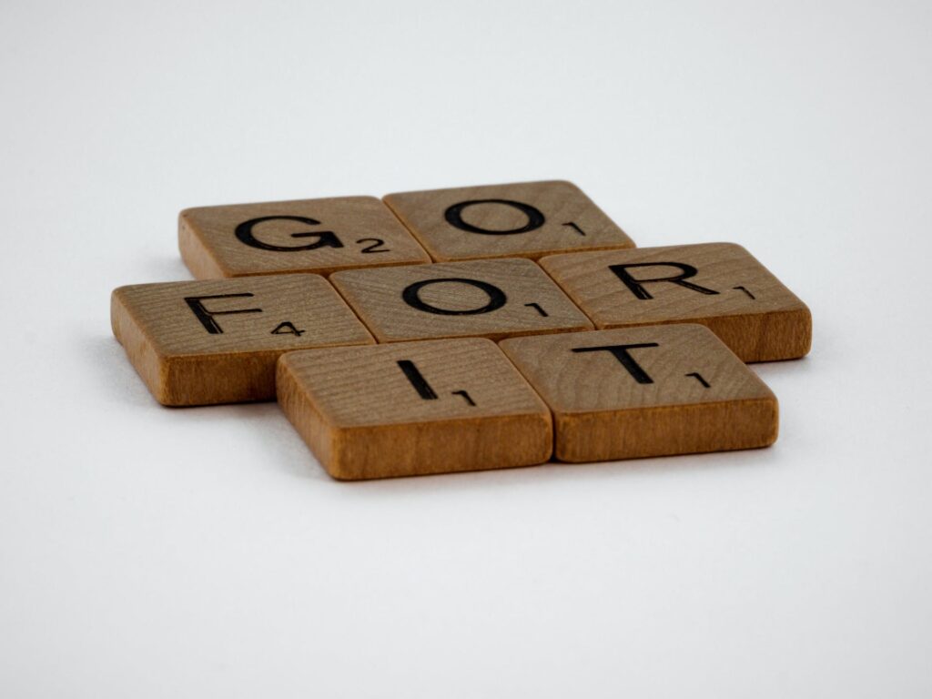 Scrabble tiles on a flat surface